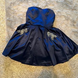 Sherri Hill size 12 Cocktail dress in midnight blue with pockets.